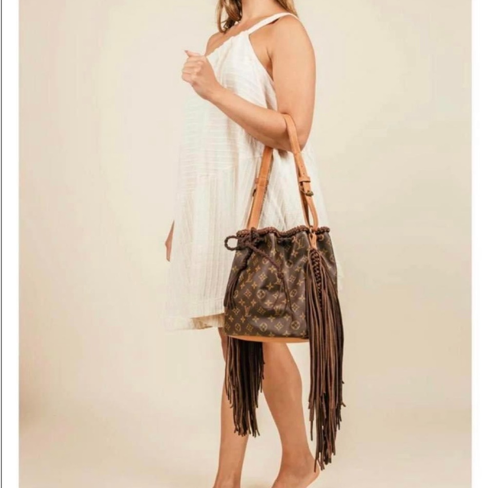 Authentic REVAMPED fringe Louis Vitton purse. Purchased from Vintage boho bags